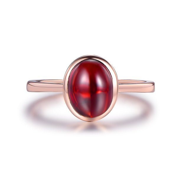 Solid 10kt gold and offers garnet solitaire delicate bezel deep red ring