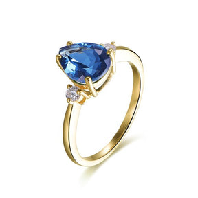 Three Stone London Blue Topaz Moissanite Ring 14K Yellow Gold - Lord of Gem Rings