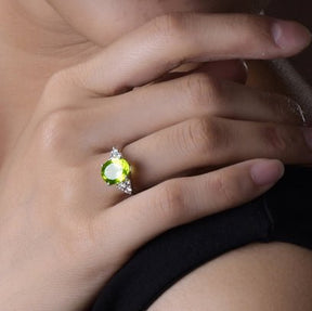 Vintage Trio Accents Oval Peridot Solitaire Ring - Lord of Gem Rings